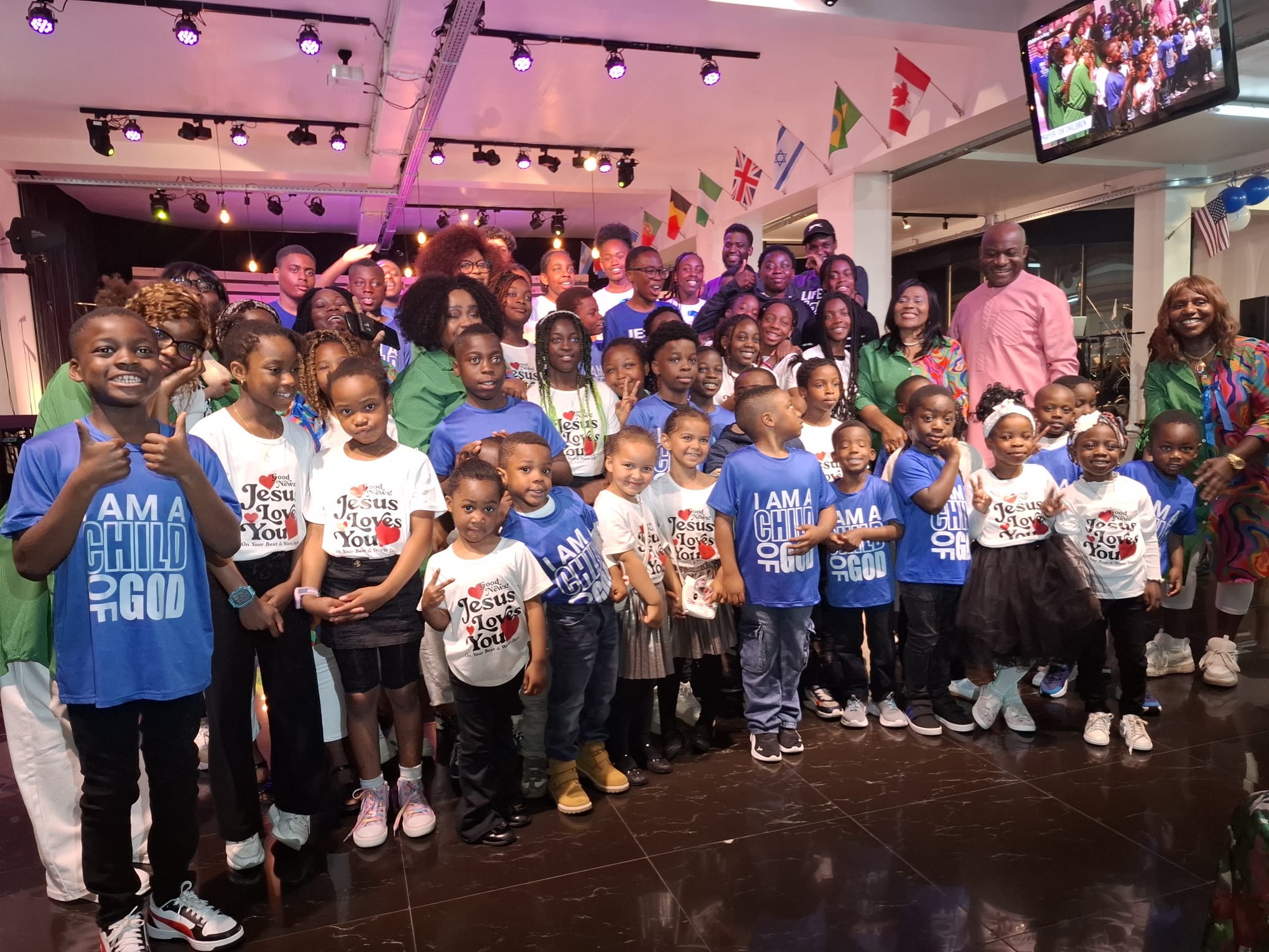 The whole children’s church together with the pastors at the Children’s Day service