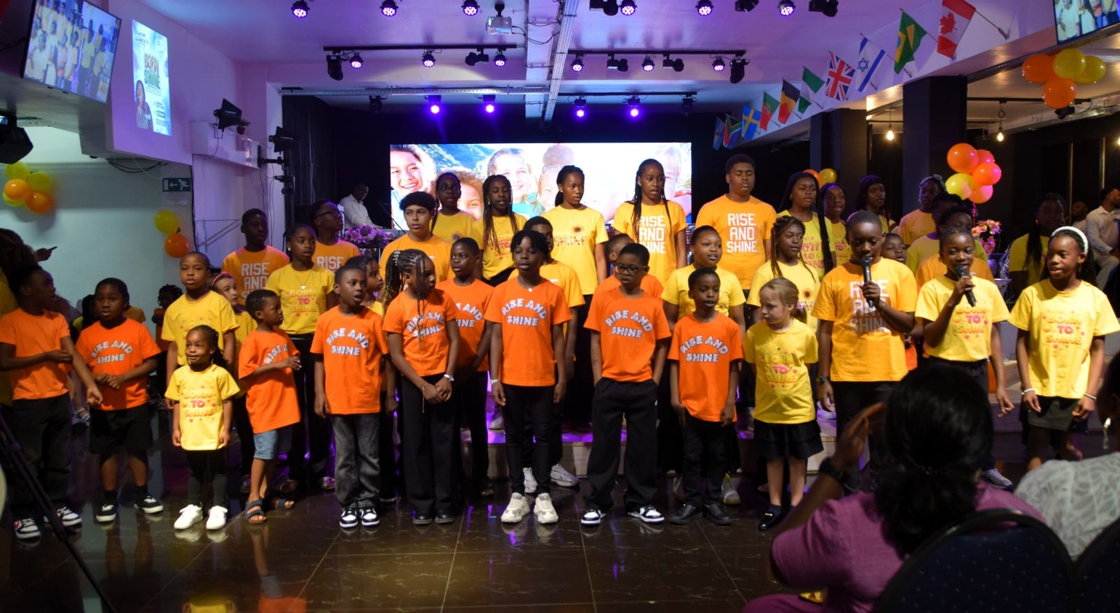 The children leading the service in their Rise and Shine t-shirts on Children’s Day