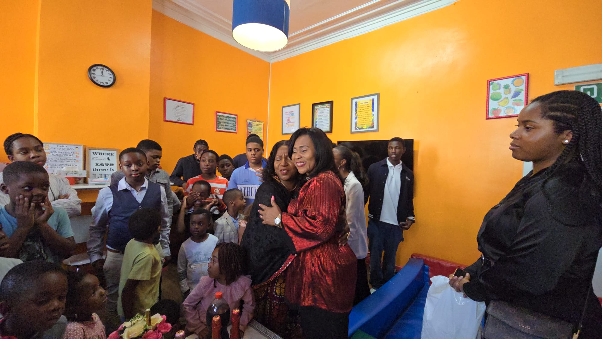 A warm embrace during a visit to the children’s classroom
