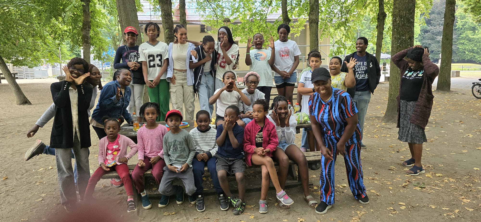 The children and their teachers together in the park on an outing