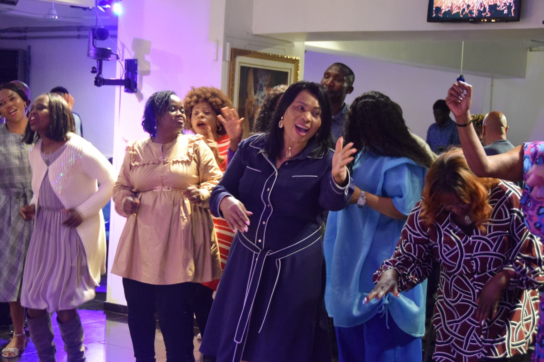 Women dancing together in worship