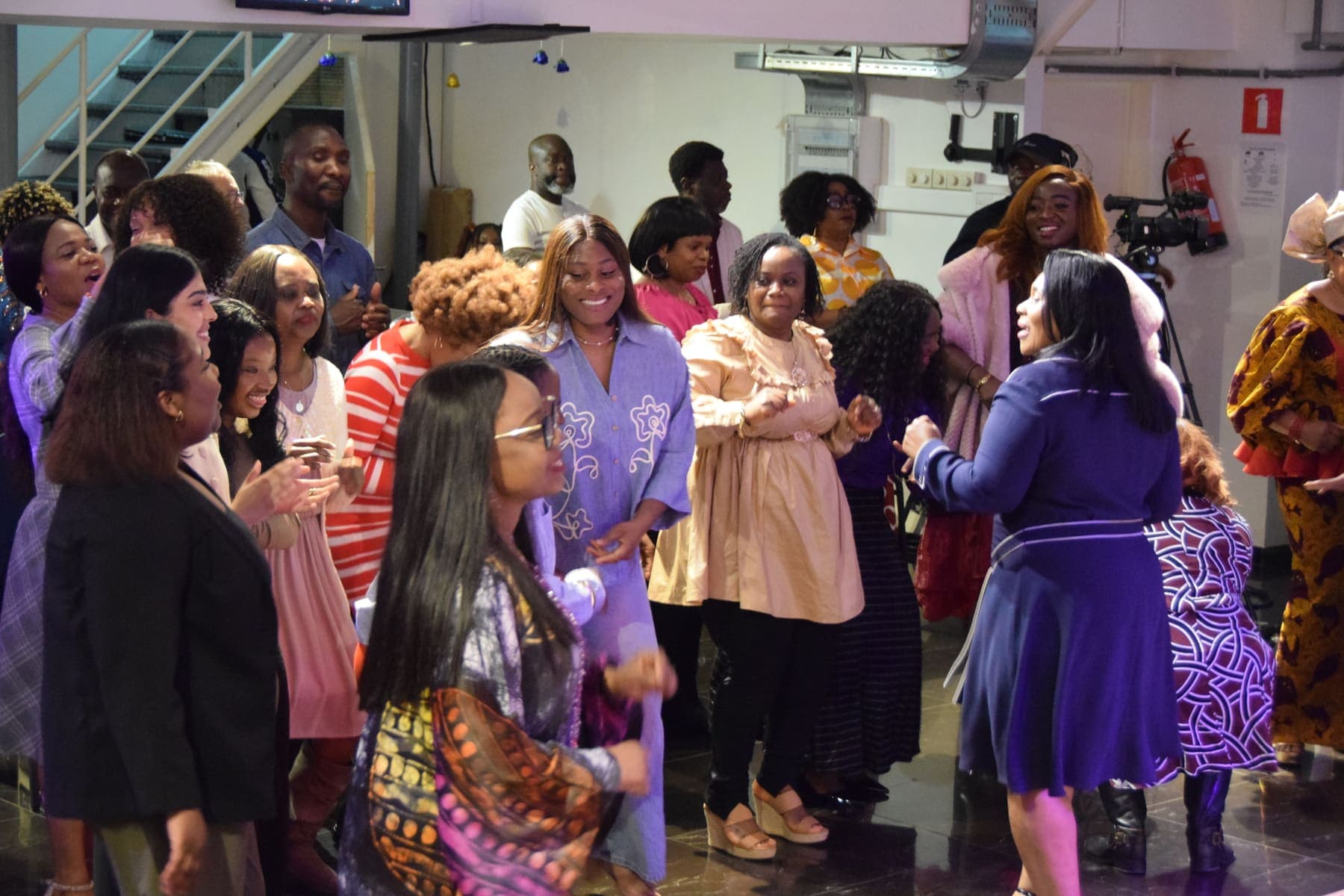 Members greeting one another after the service
